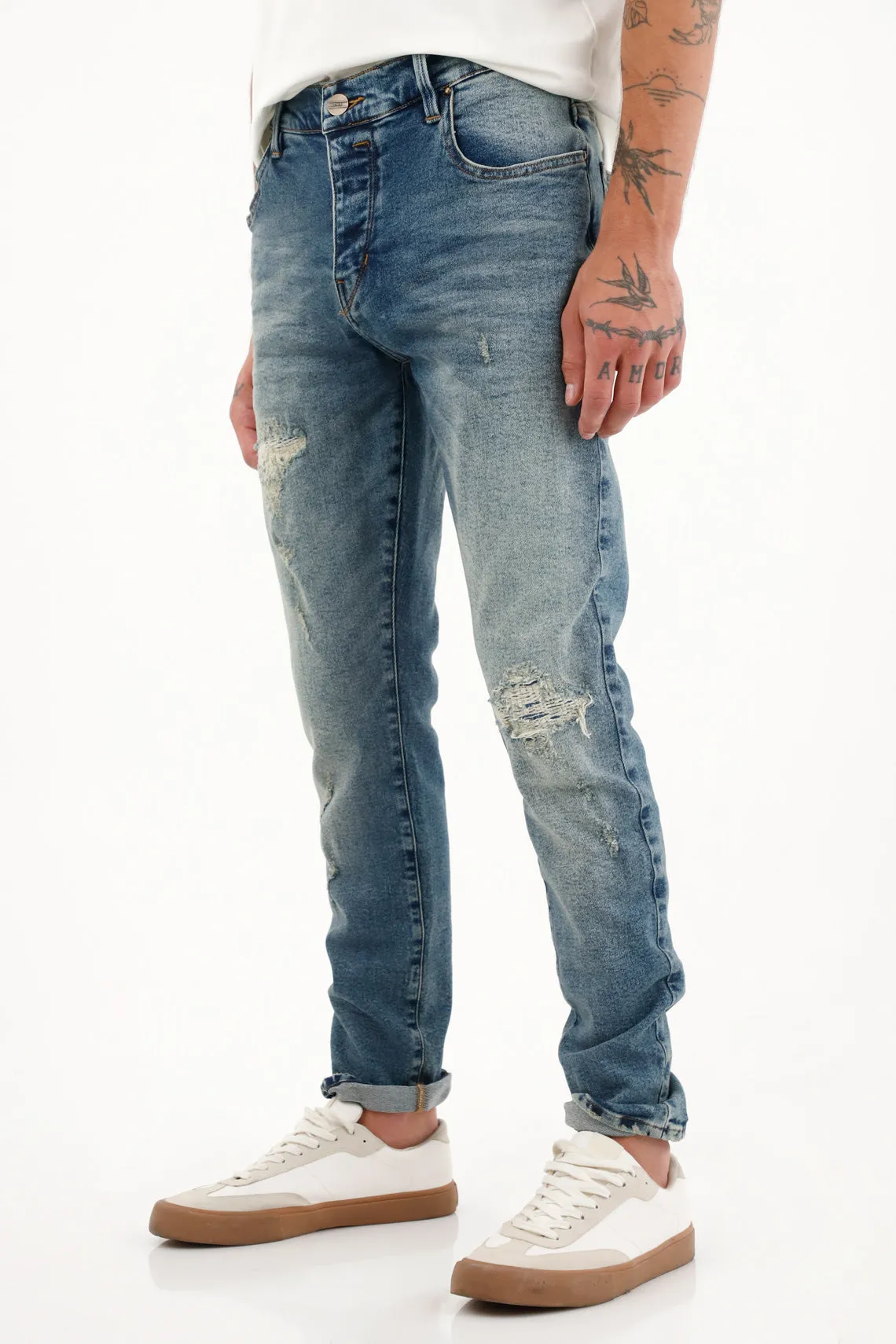 Jean Skinny tiro medio con rotos para hombre