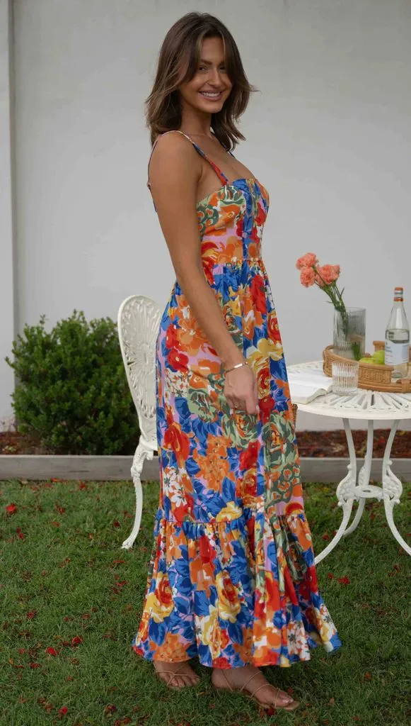 Vestido longo com decote quadrado e estampa floral vibrante